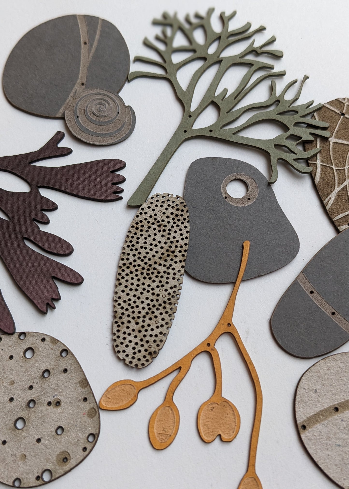 a small collection of paper pebbles & seaweed