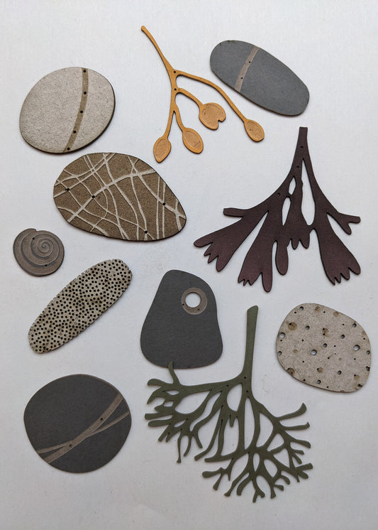 a small collection of paper pebbles & seaweed